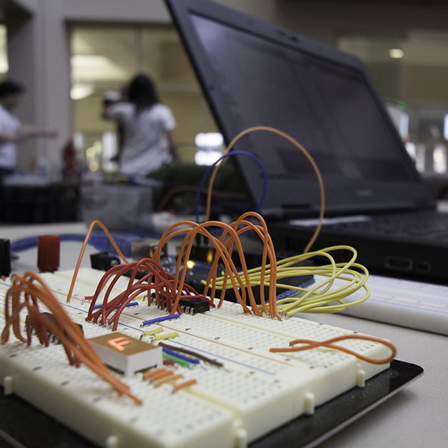 PCB milling machine creation with wires and laptop attached