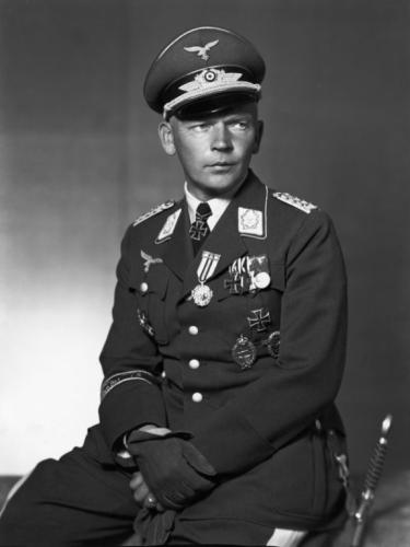 Portrait of Wolfram von Richthofen in military garb sitting in a chair