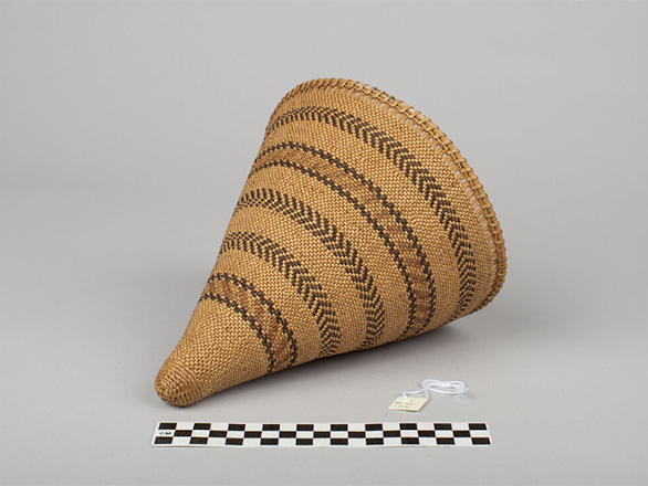 Woven basket with a conical shape.