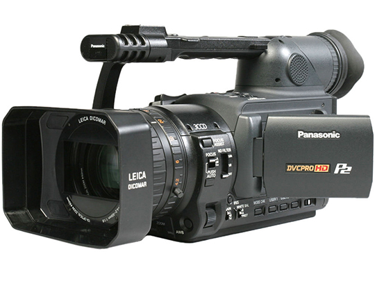 Panasonic HVX with large rectangular lens, folding and stationary viewfinders, and control buttons