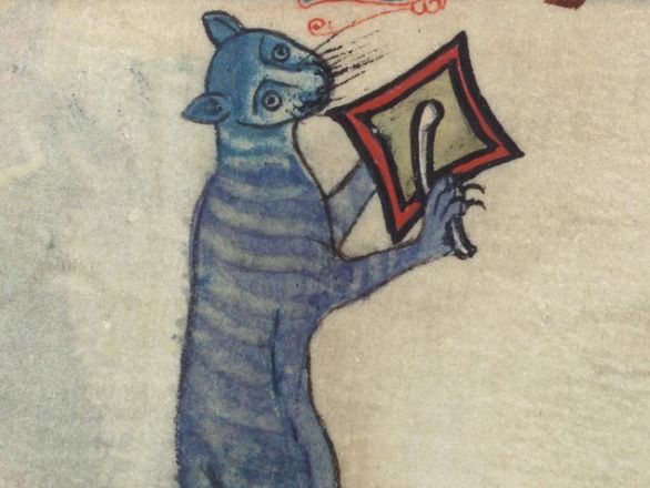An illustration of a striped cat beating a drum from a book of hours