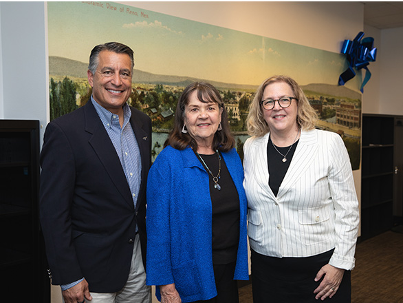 University President Brian Sandoval stands with former Nevada Attorney General Frankie Sue Del Papa and University Libraries' Dean Catherine Cardwell at the Vault grand opening event.