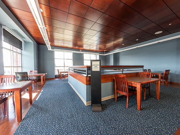 View of the Tower Quiet Study featuring large windows and a unique, wood-paneled ceiling.