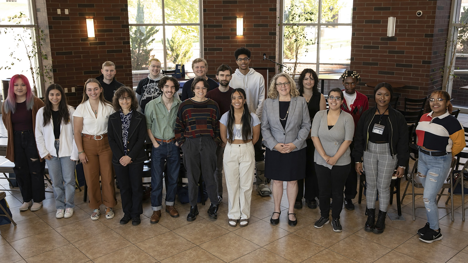 Dean Cardwell stands with the 2023 graduating students.