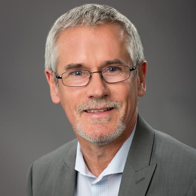 Portrait of Geoffrey Blewitt.