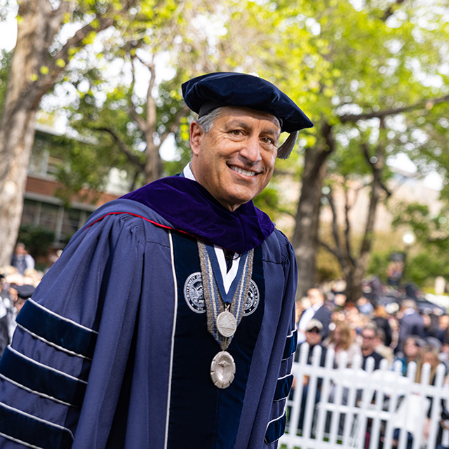 University President Brian Sandoval smiles at commencement.