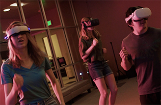 Scene from the film Final Cut, showing characters running through a virtual world as they wear VR headsets..